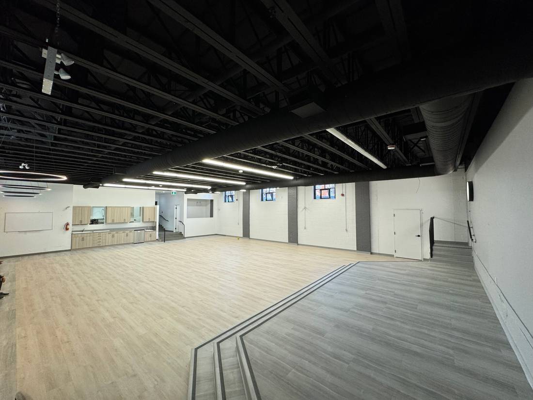 Wide view of the large indoor hall space at the Long Branch facility